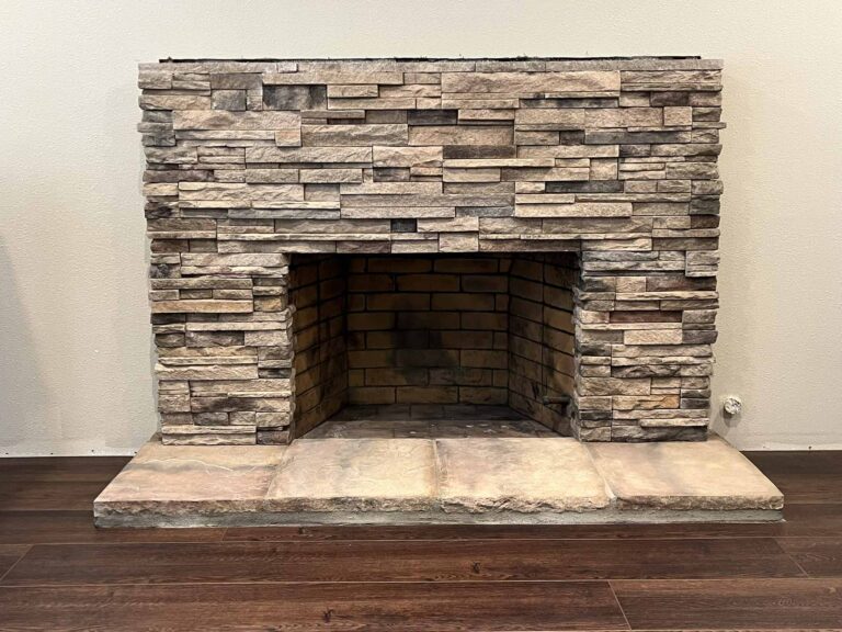 Stone fireplace with rustic wood flooring